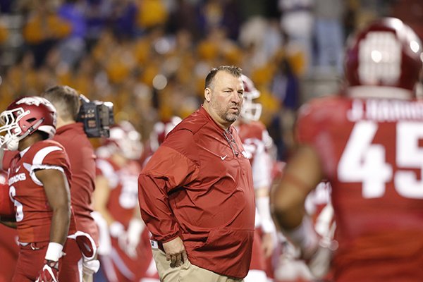 Arkansas coach Bret Bielema watches warmups prior to a game against LSU on Saturday, Nov. 12, 2016, in Fayetteville. 