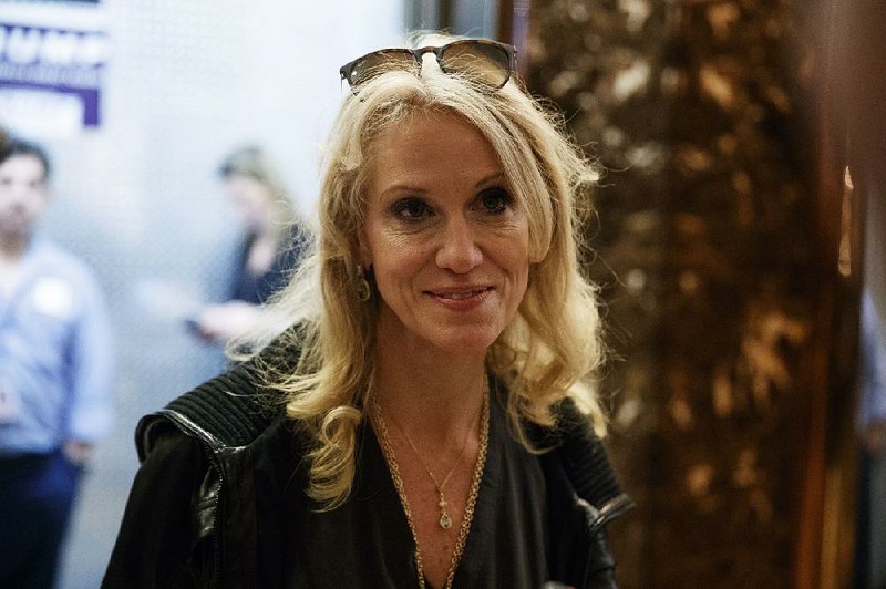 Kellyanne Conway, campaign manager and senior advisor to President-elect Donald Trump, talks with reporters as she arrives at Trump Tower, Saturday, Nov. 12, 2016, in New York.