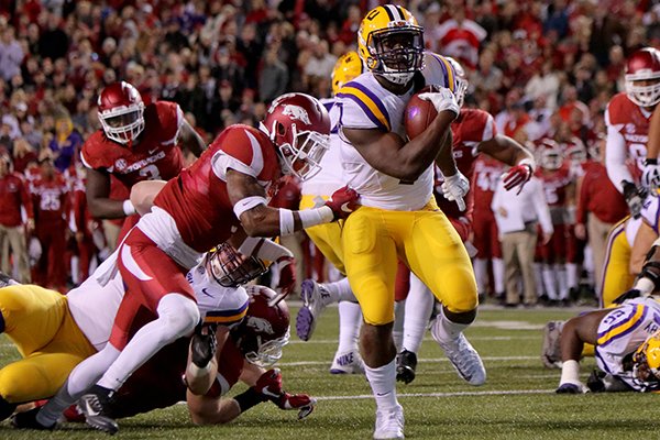 LSU running back Leonard Fournette runs for a touchdown during a game against Arkansas on Saturday, Nov. 12, 2016, in Fayetteville. 