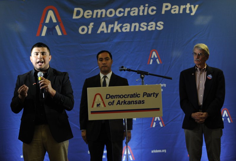 Irvin Camacho (left) of Springdale speaks March 4 alongside Rep. Joaquin Castro (center), D-Texas, and Grimsley Graham of Rogers during a kickoff celebration for Camacho’s campaign for State Representative District 89 and Graham’s campaign for State Representative District 94 at Parsons Stadium in Springdale.