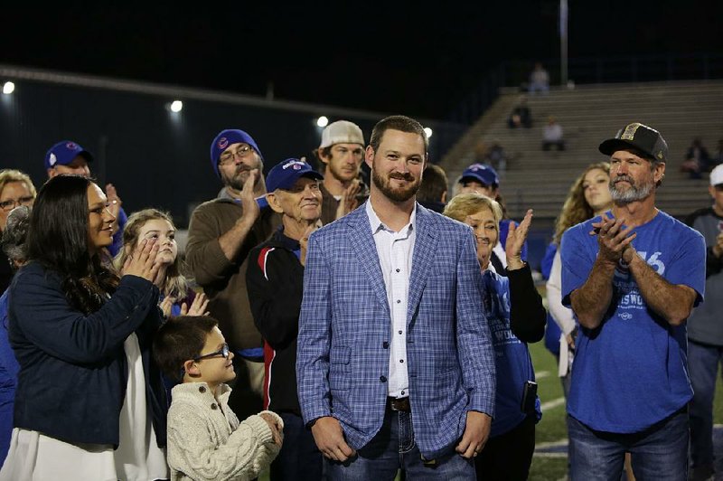 Bryant’s Travis Wood won a World Series with the Chicago Cubs 11 days ago, but he’s on the free-agent market after five seasons with the Cubs, and isn’t sure where he’ll be playing in 2017.