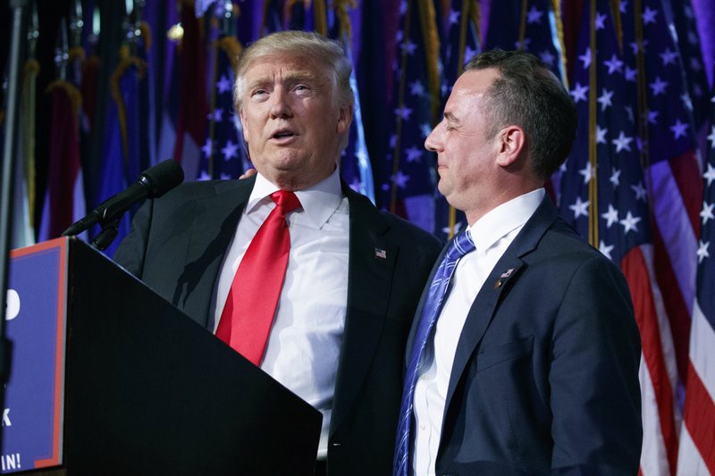 In this Wednesday, Nov. 9, 2016, photo, President-elect Donald Trump, left, stands with Reince Priebus during an election night rally in New York. (AP Photo/Evan Vucci)