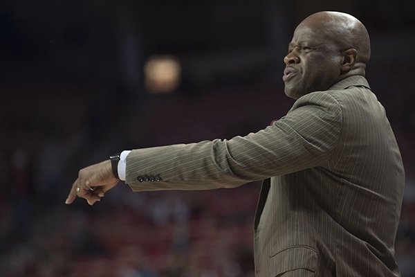 Arkansas head coach Mike Anderson shouts instructions to his squad Monday Nov. 14, 2016 against Southern Illinois at Bud Walton Arena in Fayetteville. The Razorbacks beat the Salukis 90-65.