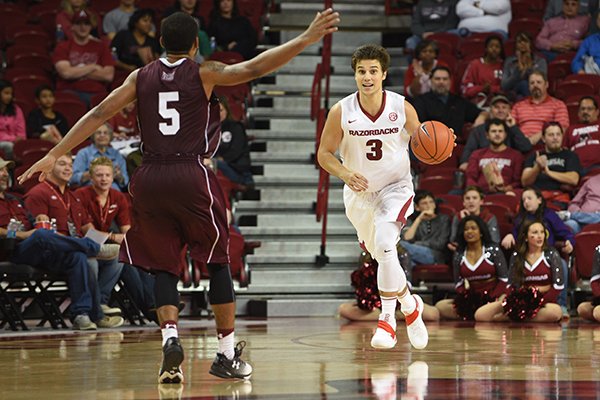 Arkansas guard Dusty Hannahs dribbles up the court during a game against Southern Illinois on Monday, Nov. 14, 2016, in Fayetteville. 