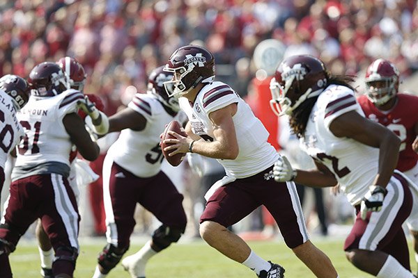 Mississippi State quarterback Nick Fitzgerald runs the ball against Alabama during the first half of an NCAA college football game, Saturday, Nov. 12, 2016, in Tuscaloosa, Ala. (AP Photo/Brynn Anderson)

