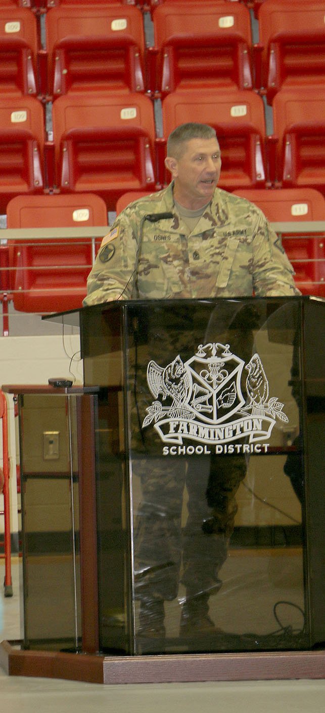COURTESY PHOTO Sgt. Major Kevin Osnes with Arkansas Natural Guard speaks at Farmington&#8217;s Veterans Assembly.