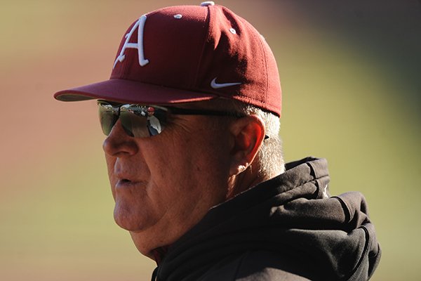 Arkansas pitching coach Dave Jorn watches during practice Friday, Jan. 23, 2015, at Baum Stadium in Fayetteville.