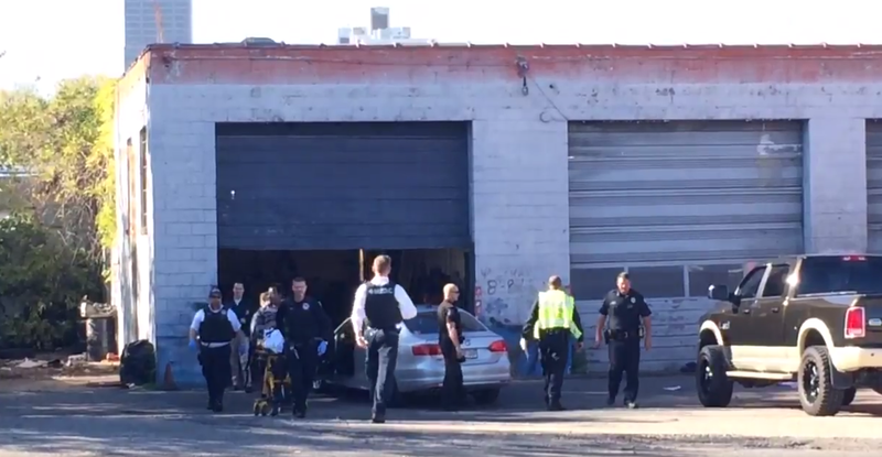 One person is taken away in a stretcher after a shooting Wednesday in downtown Little Rock.