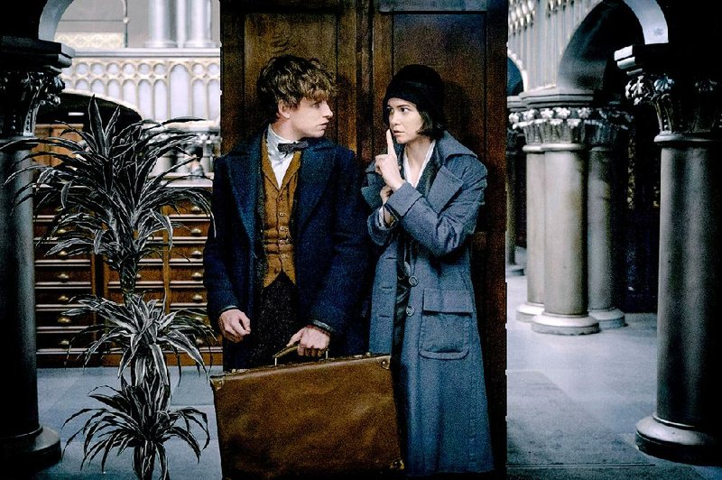 Magizoologist Newt Scamander (Eddie Redmayne) is reprimanded by Porpentina Goldstein (Katherine Waterston), a magical detective looking into the disappearance of Scamander’s menagerie of strange creatures.