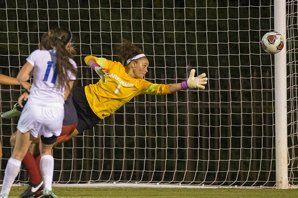 Arkansas goalkeeper Cameron Carter dives on a shot attempt during a game against Memphis on Friday, Nov. 11, 2016, in Fayetteville. 