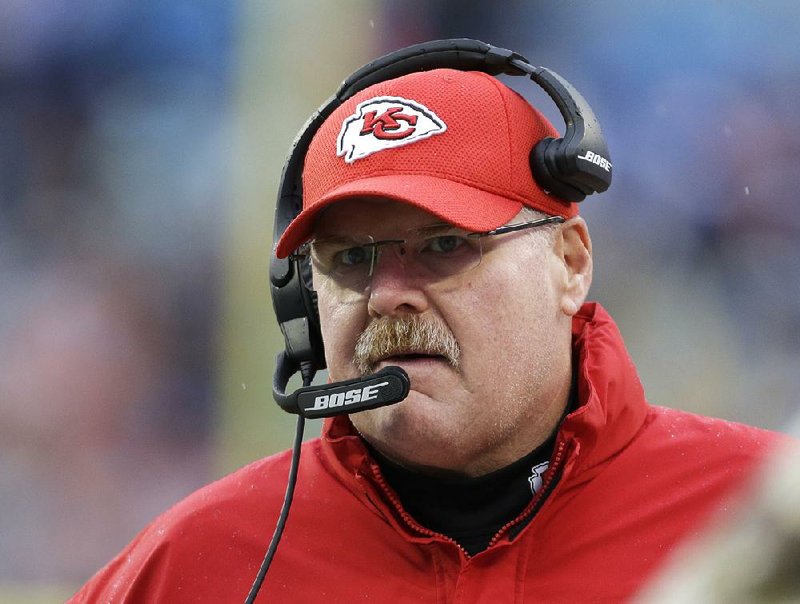 In this Sunday, Nov. 13, 2016 file photo, Kansas City Chiefs head coach Andy Reid watches the action in the first half of an NFL football game against the Carolina Panthers in Charlotte, N.C. 