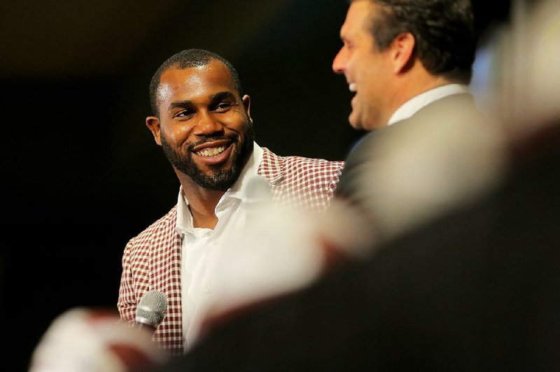 2/11/16
Arkansas Democrat-Gazette/STEPHEN B. THORNTON
Darren McFadden, left, answers questions from David Bazzel during Thursday evening's Little Rock Touchdown Club event in Little Rock.