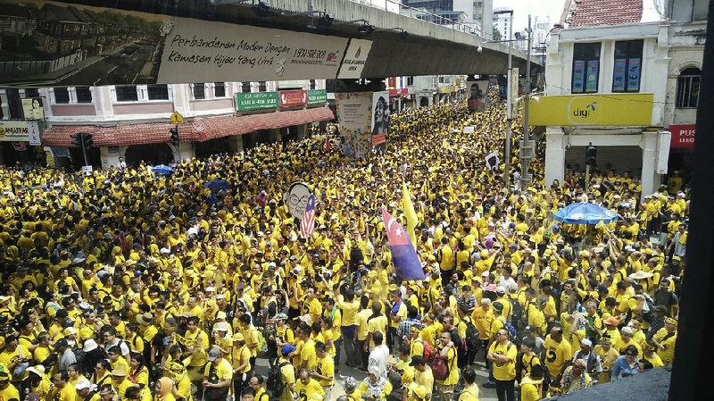 Protesters occupy a street Saturday in Kuala Lumpur, Malaysia, in a call for the prime minister to step down.

