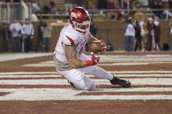 Arkansas Razorbacks tight end Austin Cantrell (44) makes a catch in the end zone from running back Rawleigh Williams against Mississippi State on Saturday, Nov. 19, 2016, at Davis Wade Stadium in Starkville, Miss., during the third quarter.