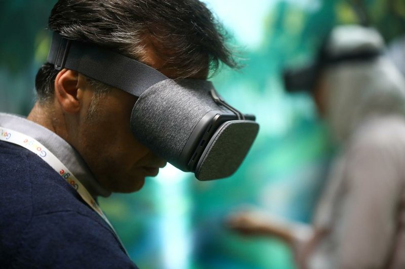 A visitor uses a Google Daydream View virtual reality headset during an event at Google’s Kings Cross office in London last week.