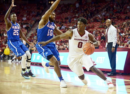 NWA Democrat-Gazette/Ben Goff AGENT ZERO: Jaylen Barford (0) of Arkansas drives past Jalen Jones (10) of UT Arlington on Friday, Nov. 18, during the game in Bud Walton Arena in Fayetteville. Barford and the Razorbacks face Minnesota in their first road game of the season tonight.