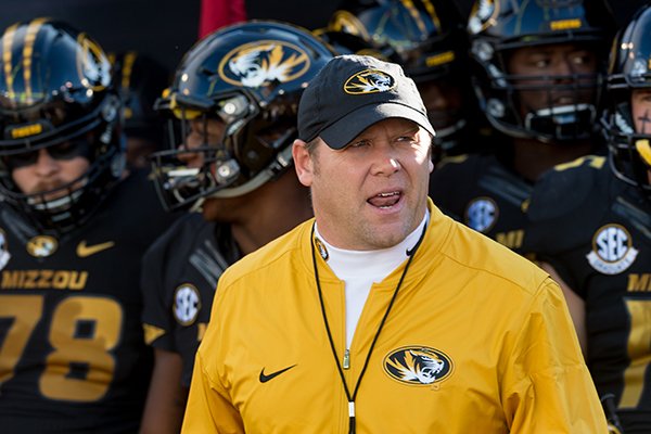 Missouri head coach Barry Odom walks on the field prior to the start of an NCAA college football game against Vanderbilt Saturday, Nov. 12, 2016, in Columbia, Mo. (AP Photo/L.G. Patterson)

