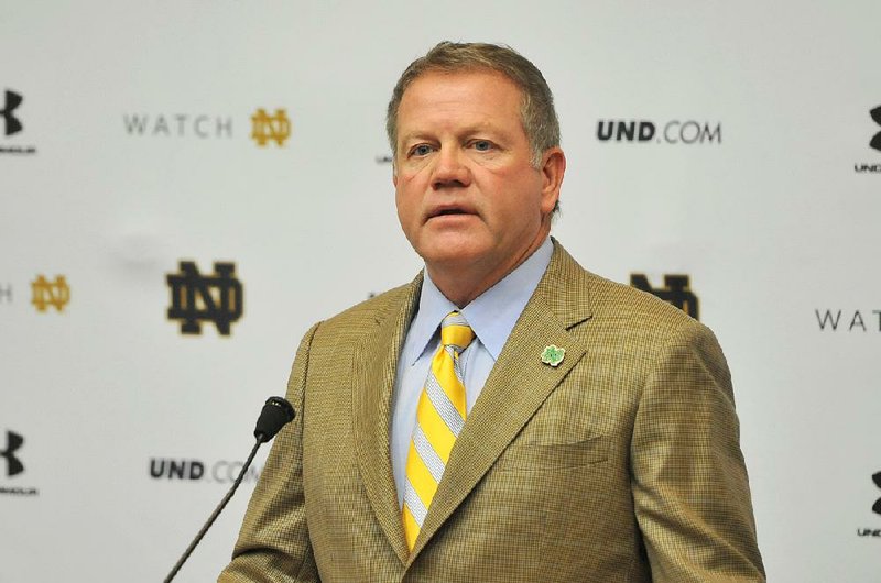 Notre Dame football coach Brian Kelly answers a question during a press conference Tuesday Oct. 7, 2014 in South Bend, Ind. 










