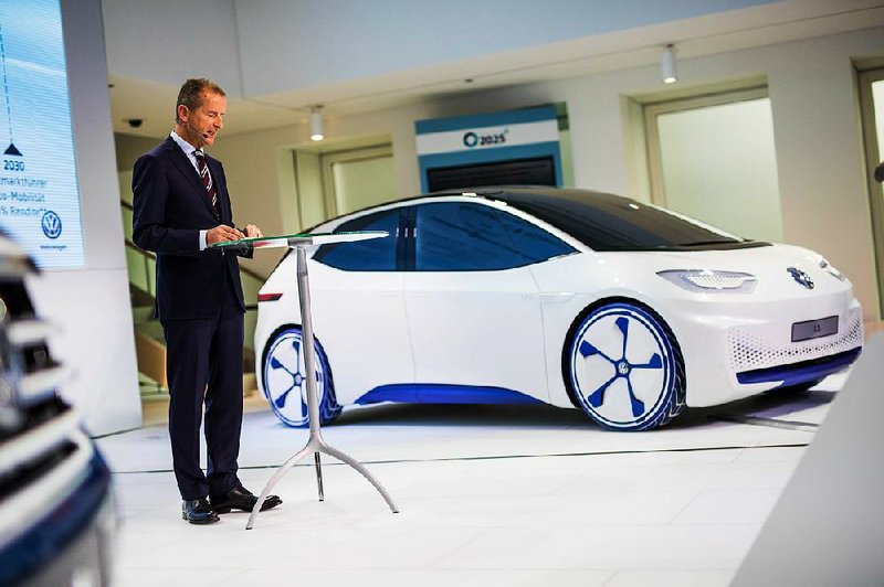 Herbert Diess, the head of Volkswagen’s namesake division, speaks Tuesday at a news conference at company headquarters in Wolfsburg, Germany. 