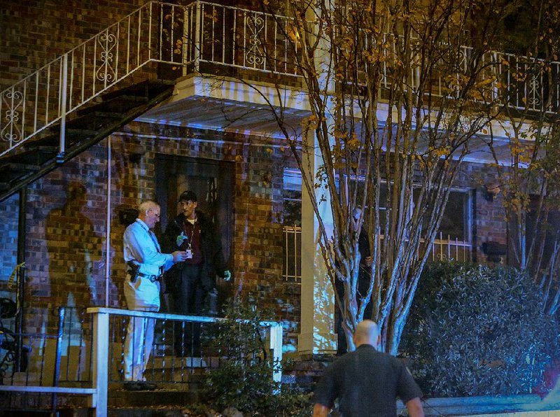 11/22/16
Arkansas Democrat-Gazette/STEPHEN B. THORNTON
Little Rock police investigate a shooting  at an apartment along B Street near N. Taylor Street Tuesday evening in Little Rock.