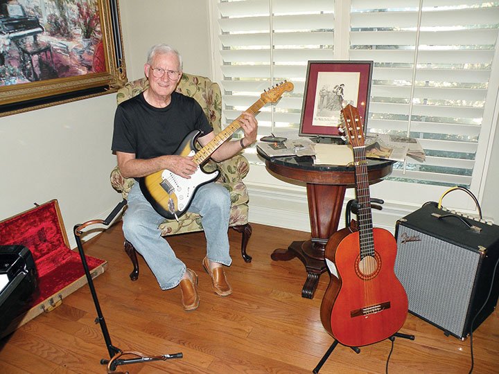 Bobby New of Quitman plays an original 1955 Fender Stratocaster guitar. He also has the original amplifier, shown at right in this photo. The self-taught musician has written an article detailing the success of local entertainers from the area.