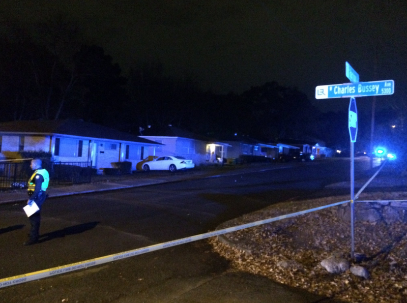 Police investigate the block where a 2-year-old child was shot in a vehicle Wednesday night in Little Rock.
