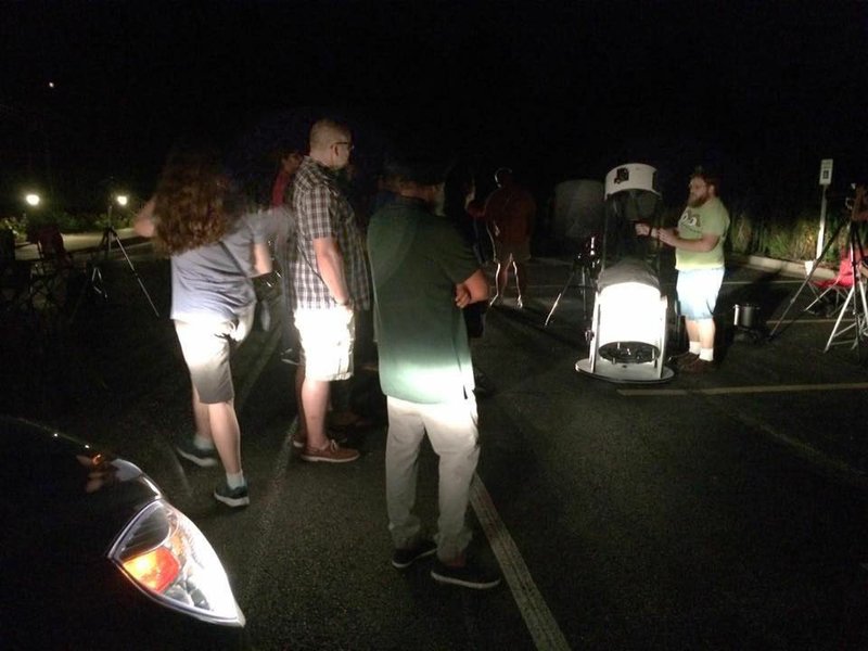 Stargazers take part in an astronomy night at Hobbs State Park-Conservation Area.