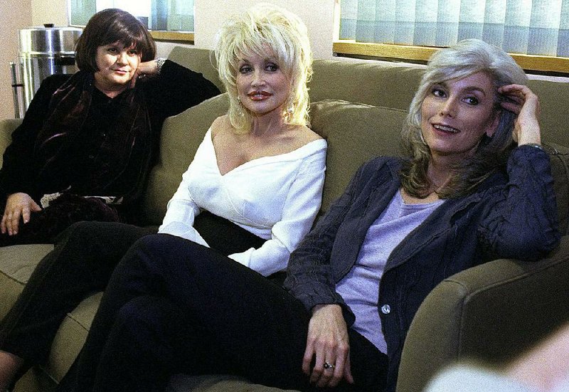 Linda Ronstadt (from left), Dolly Parton and Emmylou Harris answer questions during an interview in 1999 to promote their second album, Trio II.