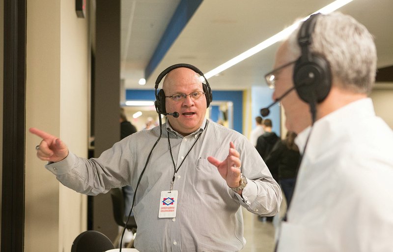 Patrick Sinclair talks on the pregame show prior to the Panthers’ second-round playoff game at North Little Rock on Nov. 18. Also pictured is Sinclair’s broadcast partner, Mark Raines.