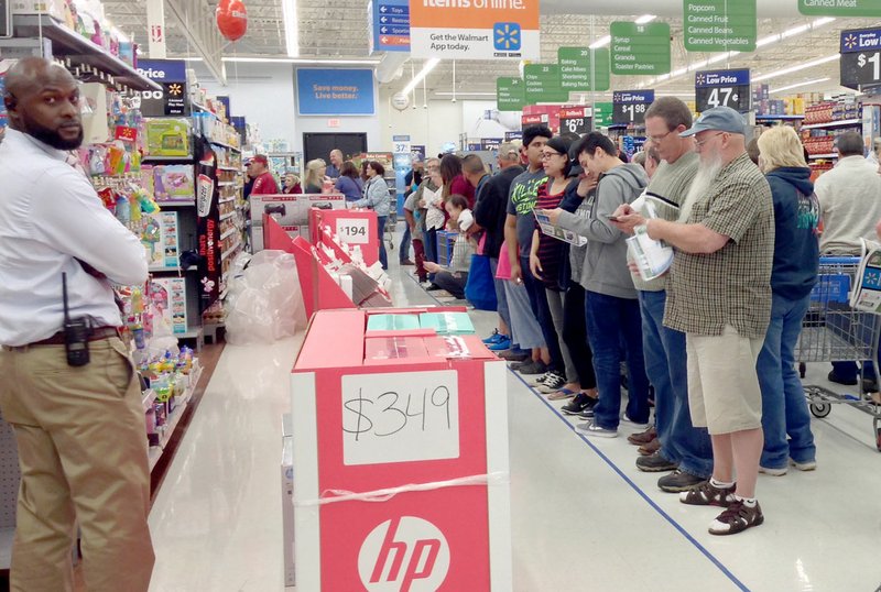 Michael Burchfiel/Siloam Sunday Shoppers lined up for Black Friday deals at Siloam Springs Walmart on Thursday night.