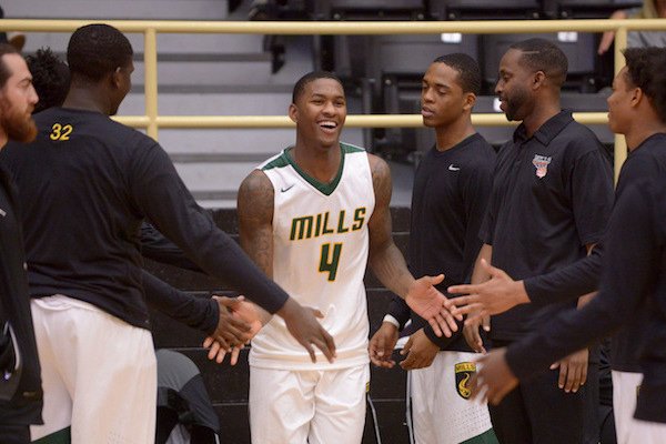 Darious Hall of Little Rock Mills takes the court during introductions on Saturday Nov. 26, 2016 before the game against Bentonville in the Bentonville Showcase basketball tournament in Bentonville's Tiger Arena.