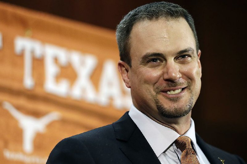 Tom Herman talks to the media during a news conference where he was introduced as Texas' new head NCAA college football coach, Sunday, Nov. 27, 2016, in Austin.