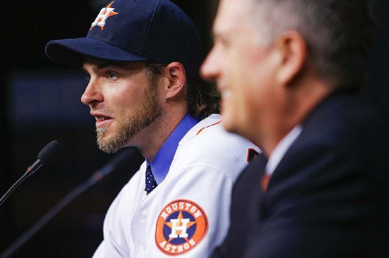 New Houston Astros outfielder Josh Reddick (left) is happy to have left California for Texas.