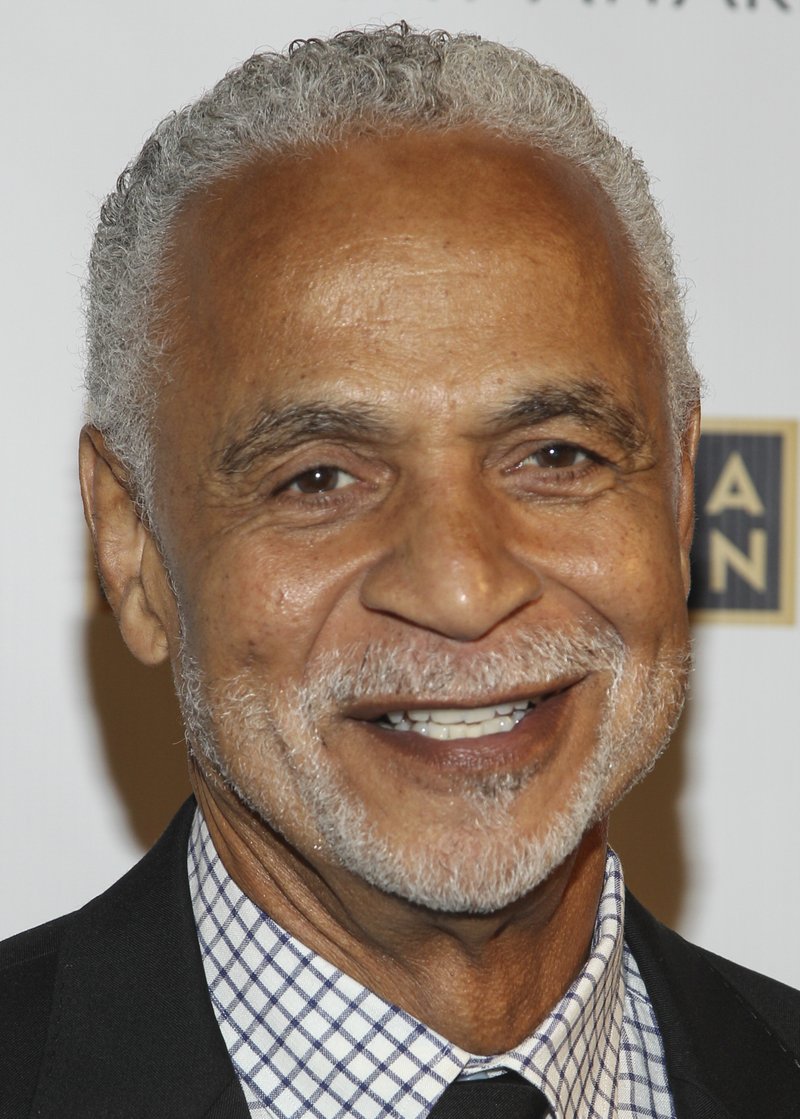 In this Sept. 17, 2013 file photo, actor Ron Glass arrives at the 65th Emmy Awards Nomination Celebration at the Academy of Television Arts and Sciences in Los Angeles. 