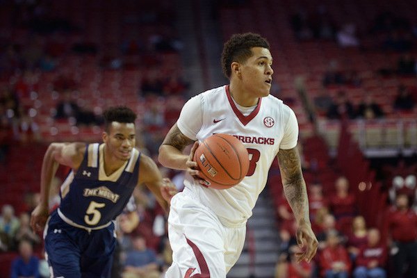 Dustin Thomas of Arkansas drives to the paint against Mount St. Mary's on Monday Nov. 28, 2016 during the game in Bud Walton Arena in Fayetteville.