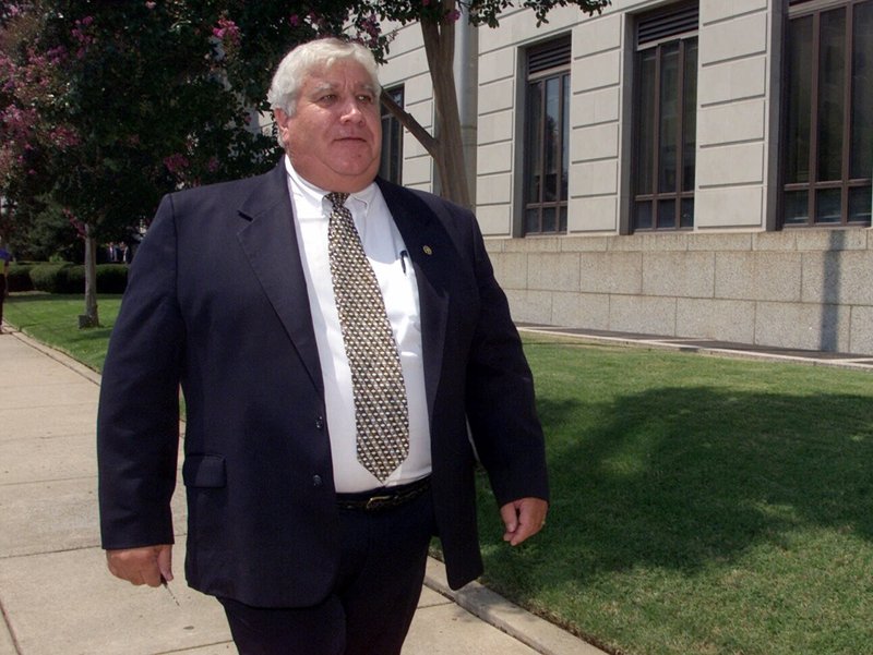 FILE — Then-Independence County Sheriff Ron Webb, of Batesville, leaves the Little Rock federal court house Tuesday, Aug. 15, 2000. A federal judge Tuesday re-sentenced the sheriff to his original punishment for conviction on a misdemeanor civil rights charge involving sexual assault. (AP Photo/Danny Johnston)
