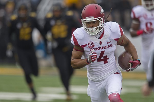 Arkansas receiver Keon Hatcher runs with the ball during a game against Missouri on Friday, Nov. 25, 2016, in Columbia, Mo.