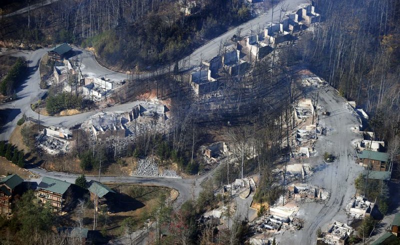 An aerial view of Gatlinburg, Tenn., on Tuesday shows several destroyed homes, many burned to their foundations by a wildfire that swept through the resort area in the Great Smoky Mountains.