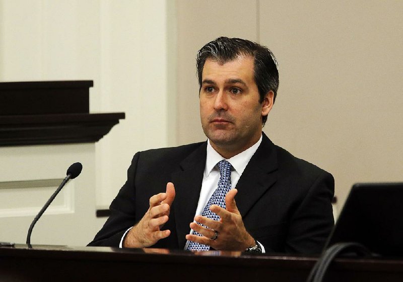 Former North Charleston police officer Michael Slager testifies during his murder trial Tuesday at the Charleston County court in Charleston, S.C.