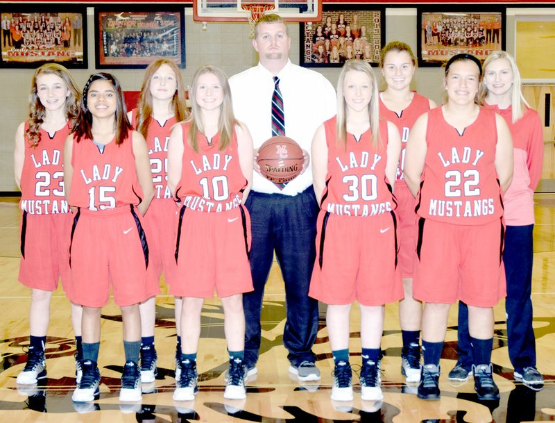 PHOTO BY RICK PECK The 2016-2017 freshman girls&#x2019; basketball team at McDonald County High School. From left to right: Emily Thornton, Alexia Estrada, Addison Mick, Grace Poland, coach Jonathon Vires, Jessica Latham, Jaylie Sanny, Alison Nicoletti and Sydney Taylor.