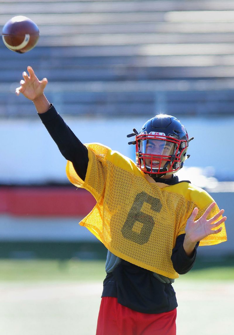 Russellville quarterback Cale Fulsom, shown during practice Wednesday at War Memorial Stadium in Little Rock, has thrown for 2,582 yards with 24 touchdowns and 7 interceptions this season, helping lead the Cyclones to Saturday’s Class 6A championship game against Greenwood.
