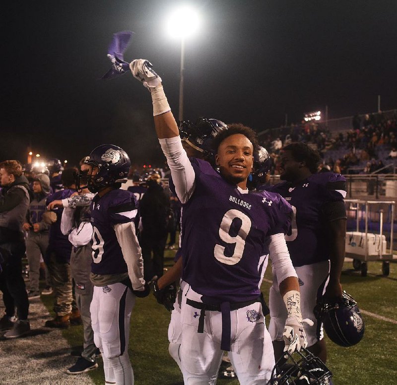 Terrance Rock, Fayetteville receiver celebrates on the sidelines as time runs out Friday, November 25, 2016 as Fayetteville beats Bentonville 46-21 in the 7A Semi finals at Fayetteville High School.