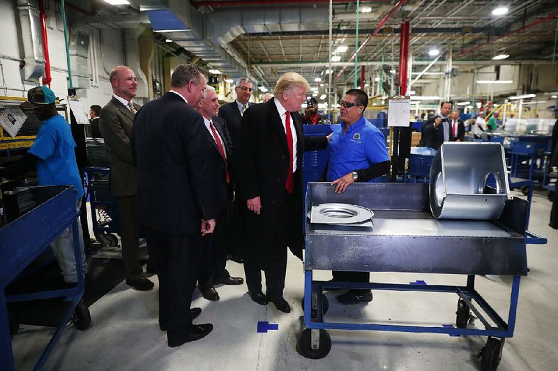 President-elect Donald Trump tours a Carrier plant Thursday in Indianapolis.