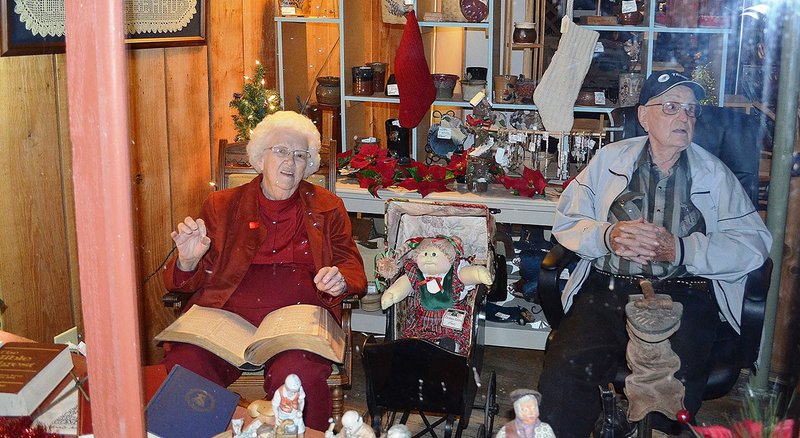 Billie, left, and Jim Clinkingbeard are shown in a Living Museum window display with some of the items in storage from their former Family Shoe Store on Main Street, including some of Jim’s shoe-repair equipment and a doll from Billie’s doll collection. The couple opened the store in 1947 and retired in 2014.