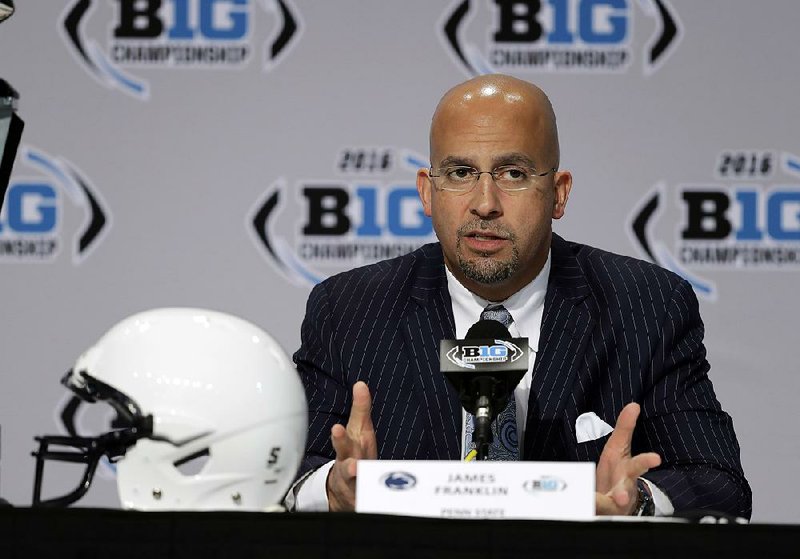 Penn State head coach James Franklin responds to a question during a news conference for the Big Ten Conference championship NCAA college football game Friday, Dec. 2, 2016, in Indianapolis. 