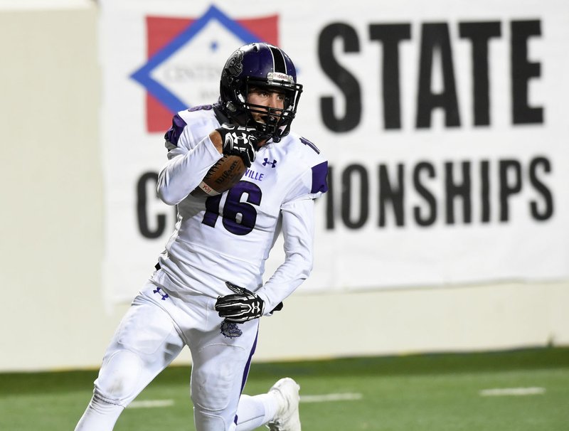 Luke Waller (16), Fayetteville High defensive back, returns an interception for a touchdown Friday against North Little Rock at War Memorial stadium in Little Rock.