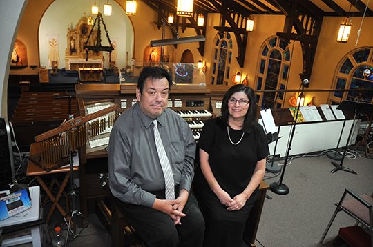 The Sentinel-Record/Mara Kuhn ONE YEAR: Rick Warren, principal organist and pianist, left, and Sheree O'Rorke, director of music, have served one year at St. Mary of the Springs Catholic Church.