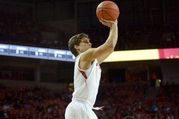 Arkansas senior guard Dusty Hannahs rises for a 3-pointer in the Razorbacks' 99-62 win over Austin Peay on Saturday, December 3.