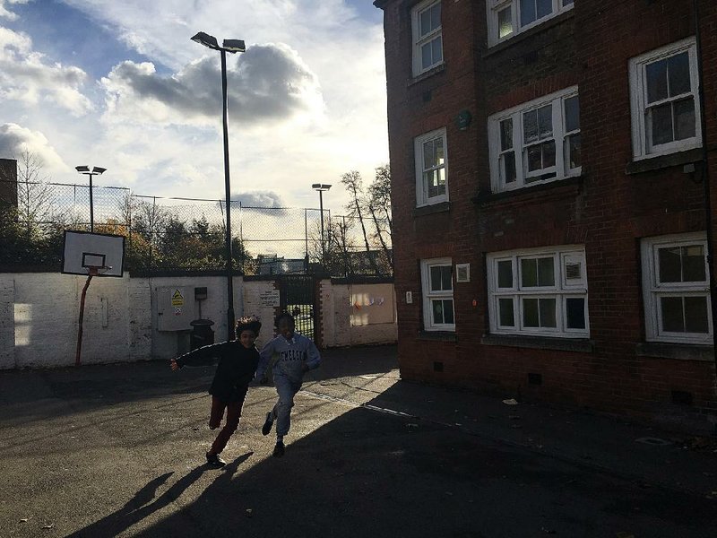 Schoolchildren run their daily mile in late November at Torriano primary school in north London, part of a growing grass-roots effort by some schools to get kids moving.