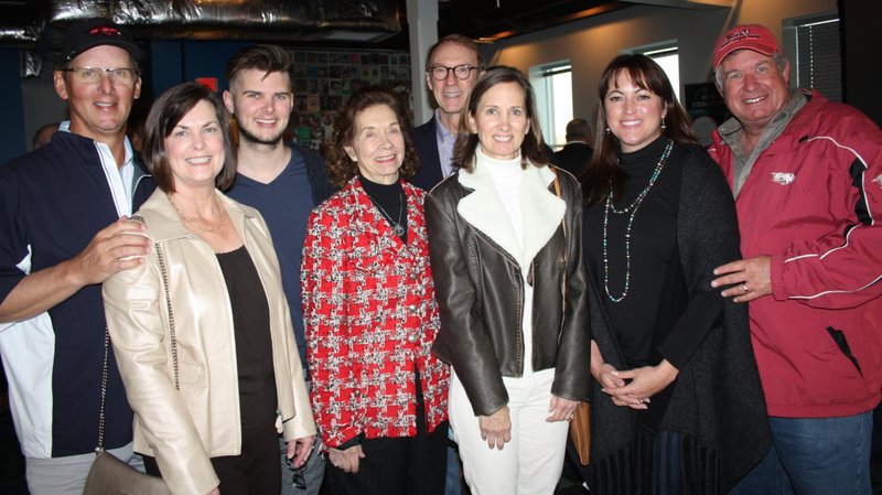 Jim and Ann McKenzie (from left), Marshall McKenzie, Marilyn Bogle, Bob and Becky Alexander and Tina and David Bogle help support early childhood development at the Giving Tuesday reception at The Walmart Museum.